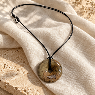 CRYSTAL DISC NECKLACE