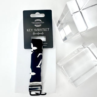BLACK AND WHITE KEY WRISTLET